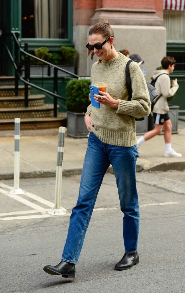 Karlie Kloss in an Olive Sweater