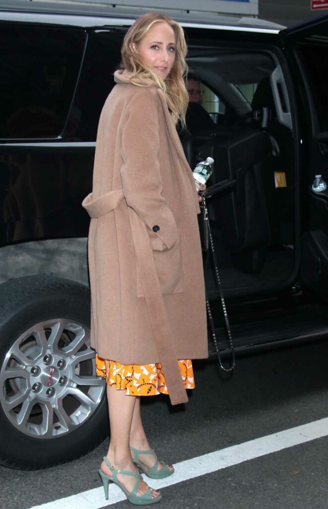 Kim Raver in a Tan Coat