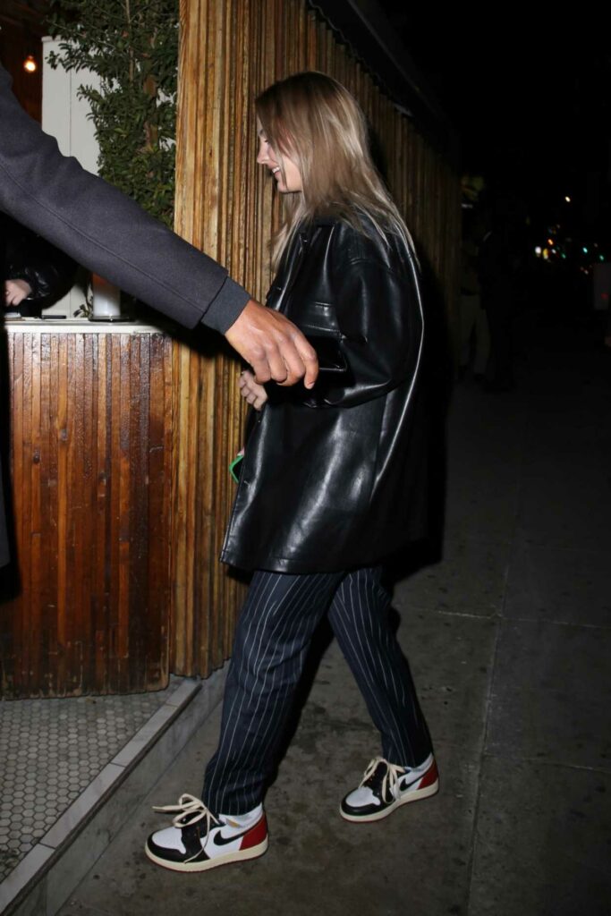 Madelyn Cline in a Black Leather Jacket Arrives at The Nice Guy in West Hollywood 02/07/2022