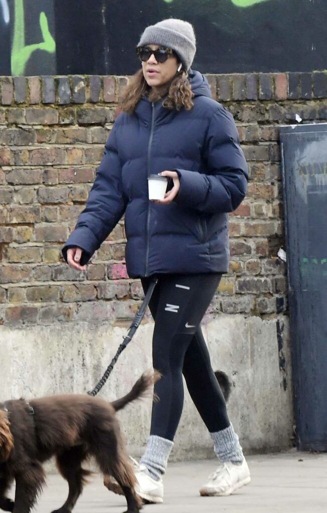 Zawe Ashton in a Blue Puffer Jacket