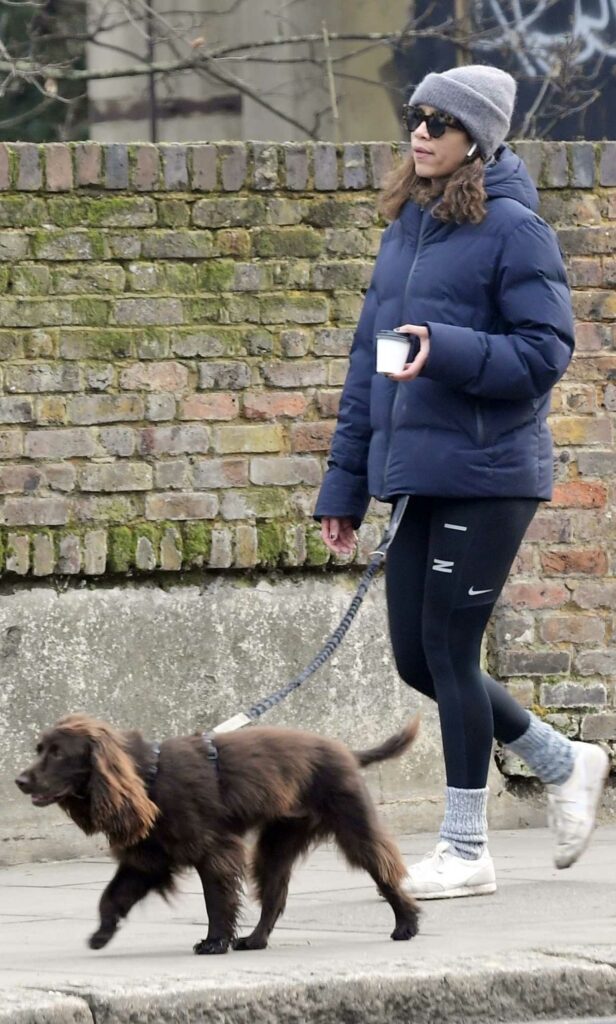 Zawe Ashton in a Blue Puffer Jacket