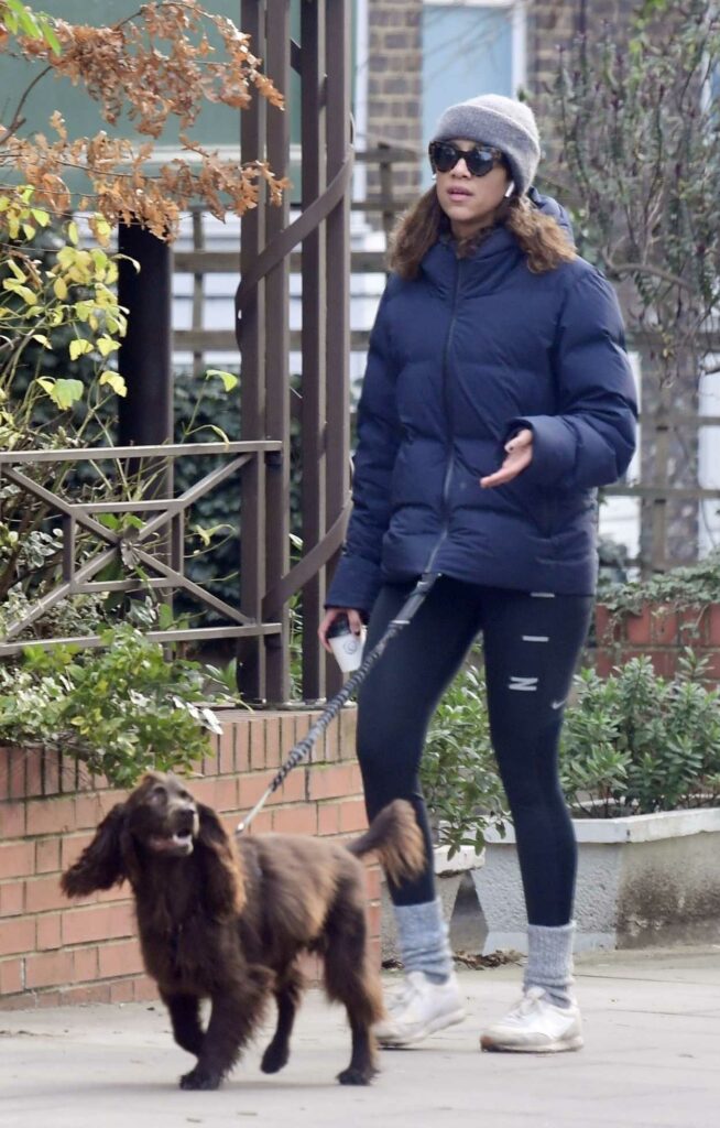 Zawe Ashton in a Blue Puffer Jacket