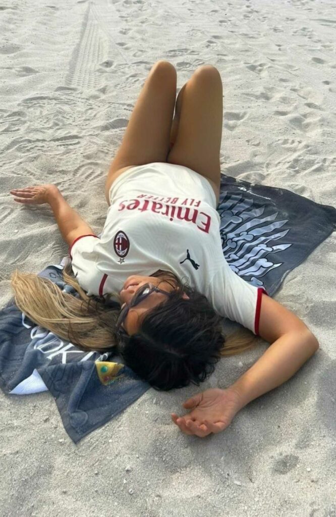Claudia Romani in a Red Striped Bikini