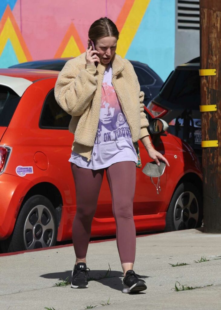 Kristen Bell in a Purple Leggings