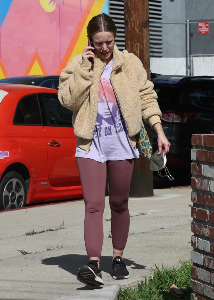 Kristen Bell in a Purple Leggings