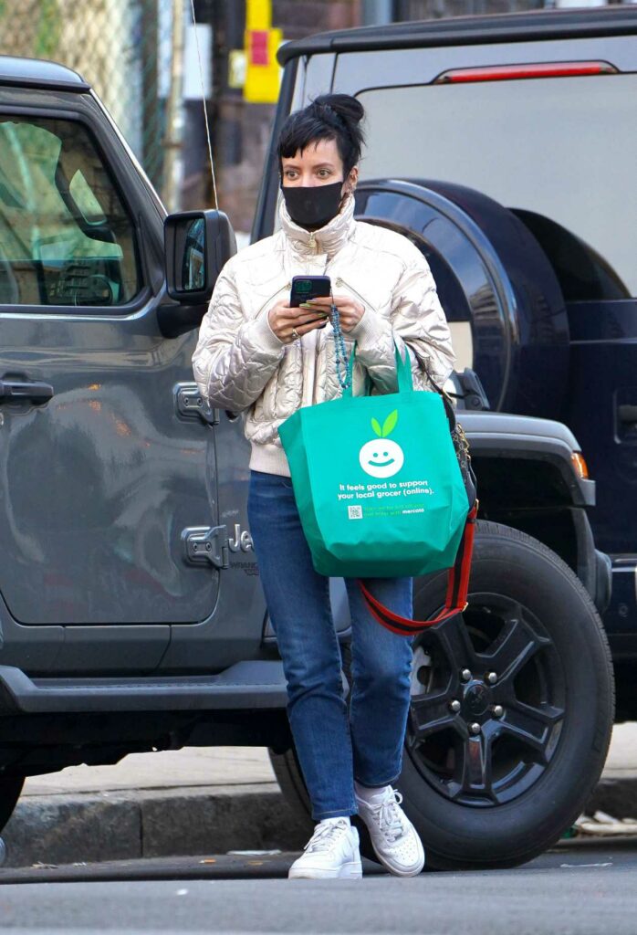 Lily Allen in a Black Protective Mask