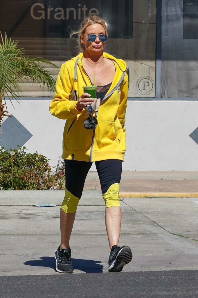 Nicollette Sheridan in a Yellow Hoodie