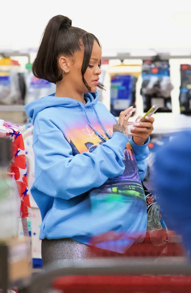 Rihanna in a Blue Hoodie