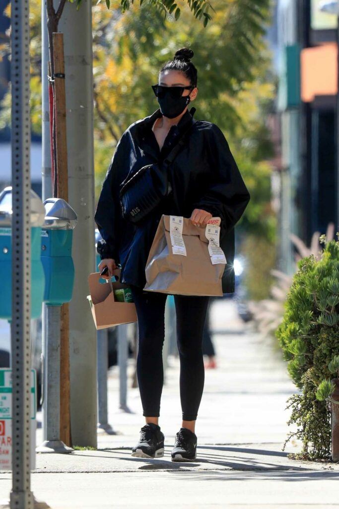 Shay Mitchell in a Black Protective Mask