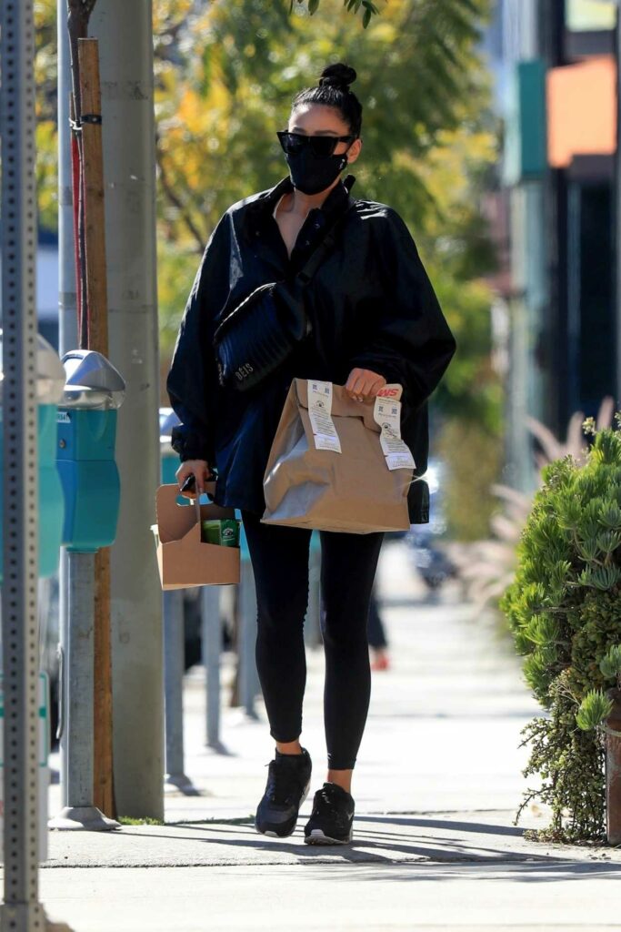Shay Mitchell in a Black Protective Mask