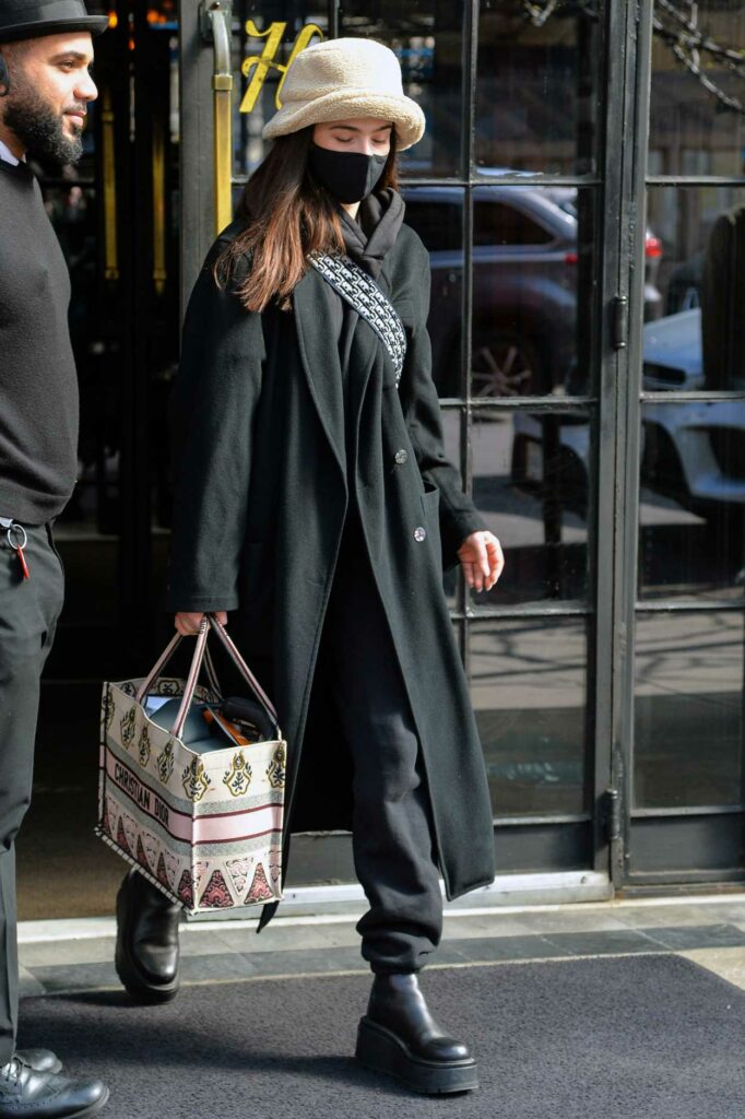 Zoey Deutch in a Black Coat