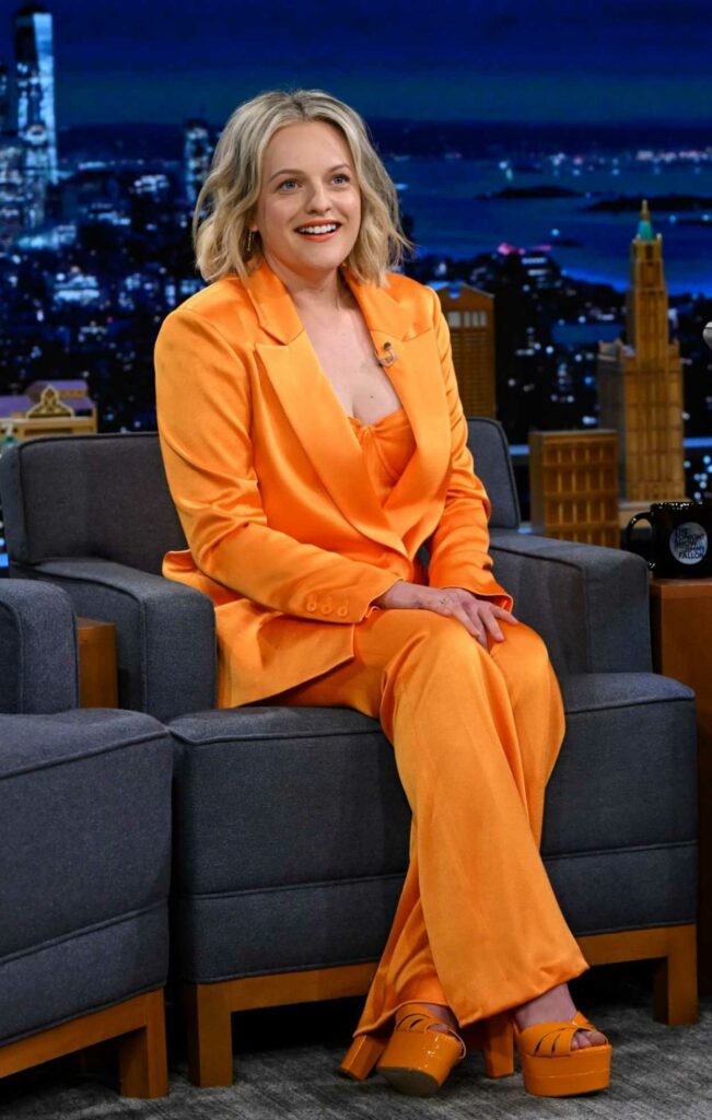 Elisabeth Moss in an Orange Pantsuit