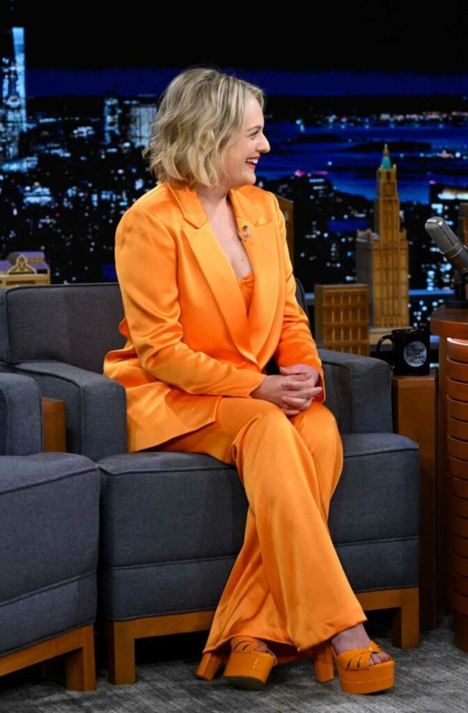Elisabeth Moss in an Orange Pantsuit