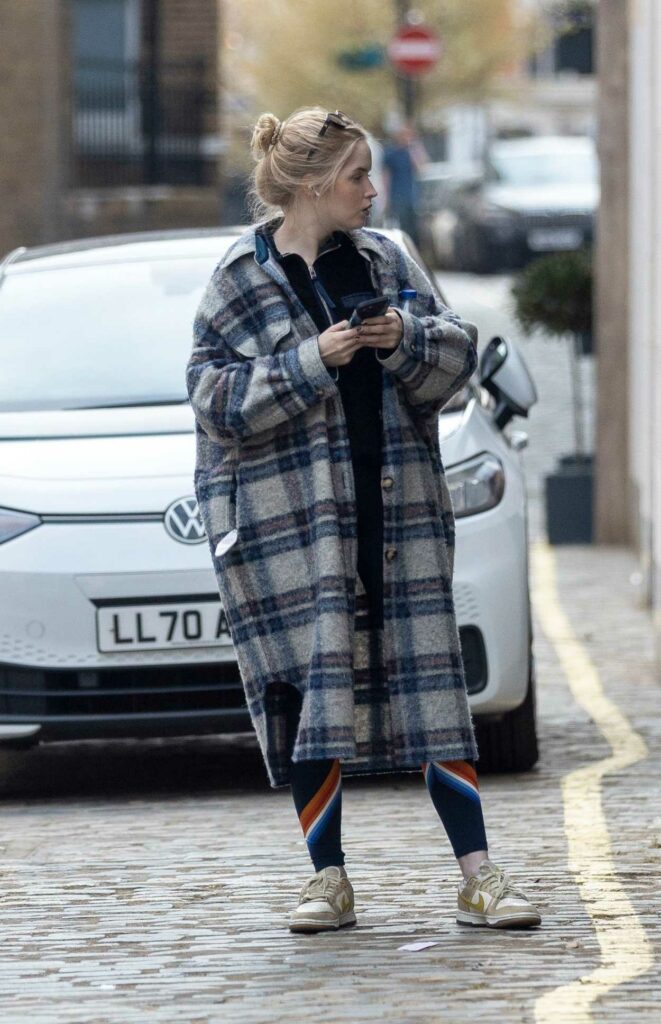 Ellie Bamber in a Plaid Coat