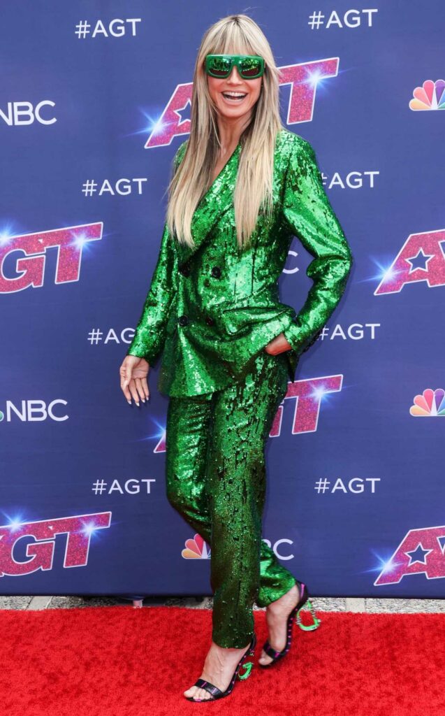 Heidi Klum in a Green Pantsuit