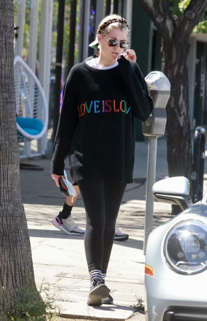 Lucy Boynton in a Black Sweatshirt