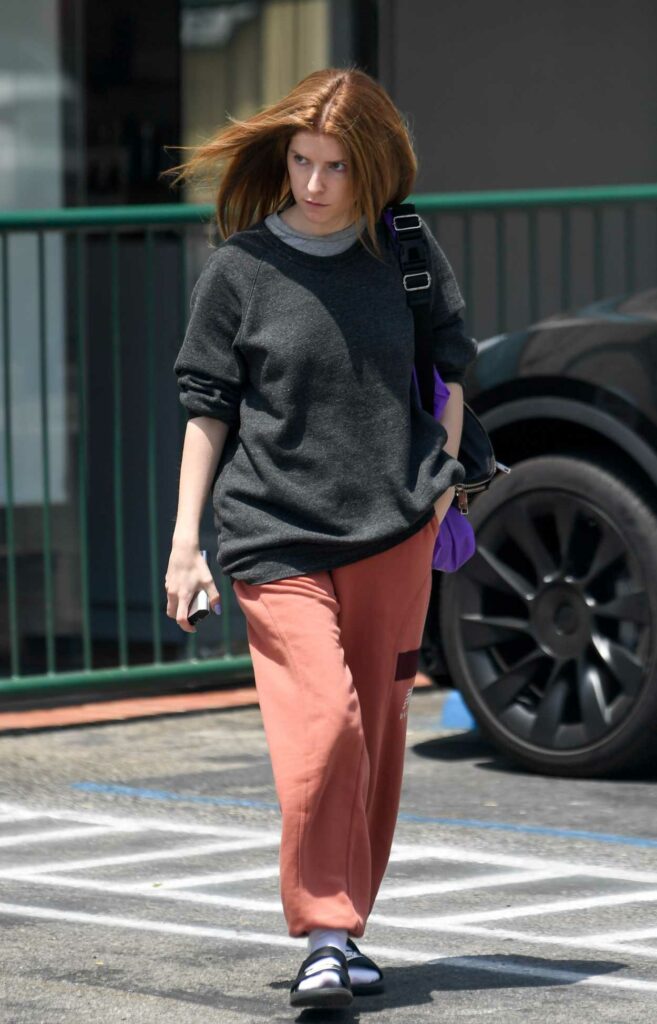 Anna Kendrick in a Red Sweatpants