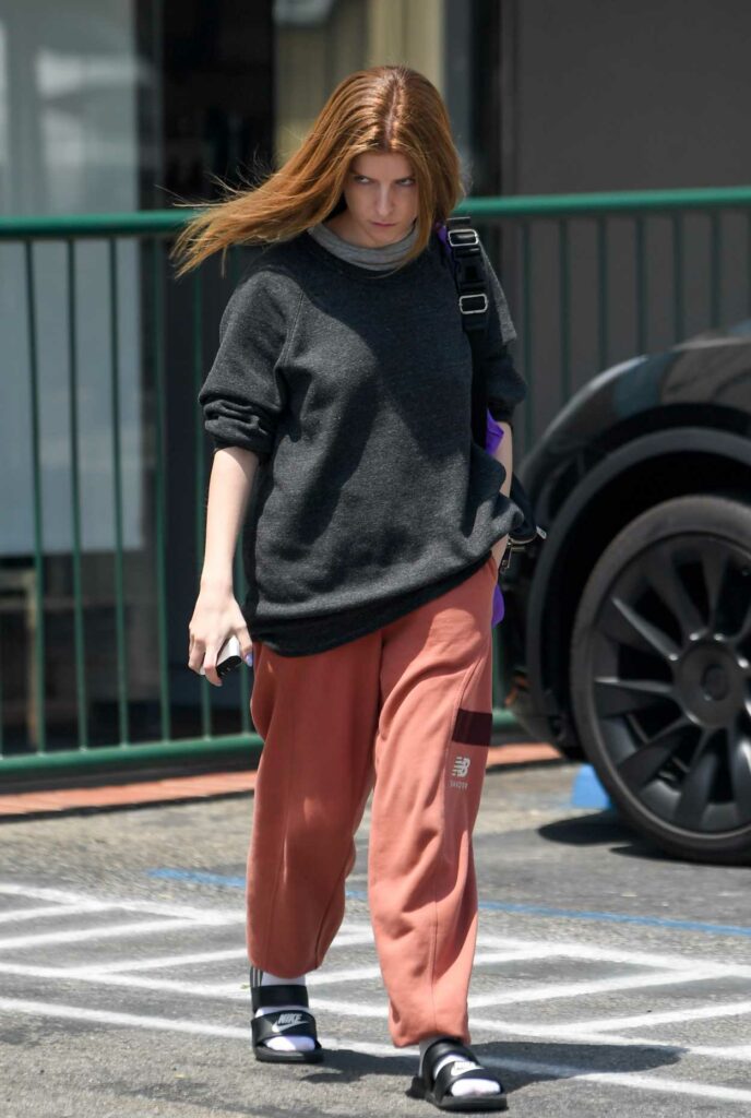 Anna Kendrick in a Red Sweatpants