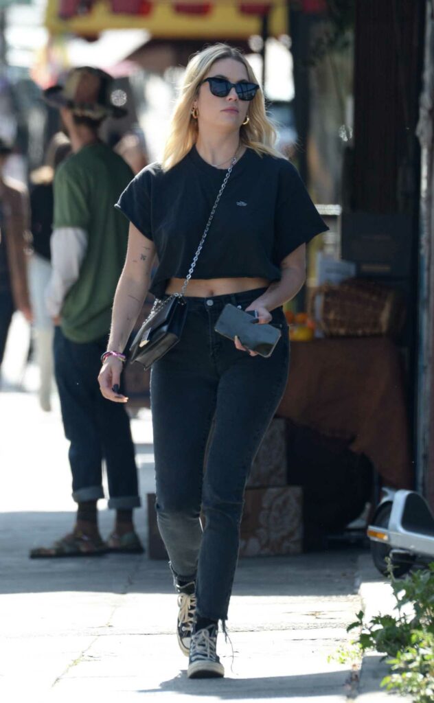 Ashley Benson in a Black Cropped Tee