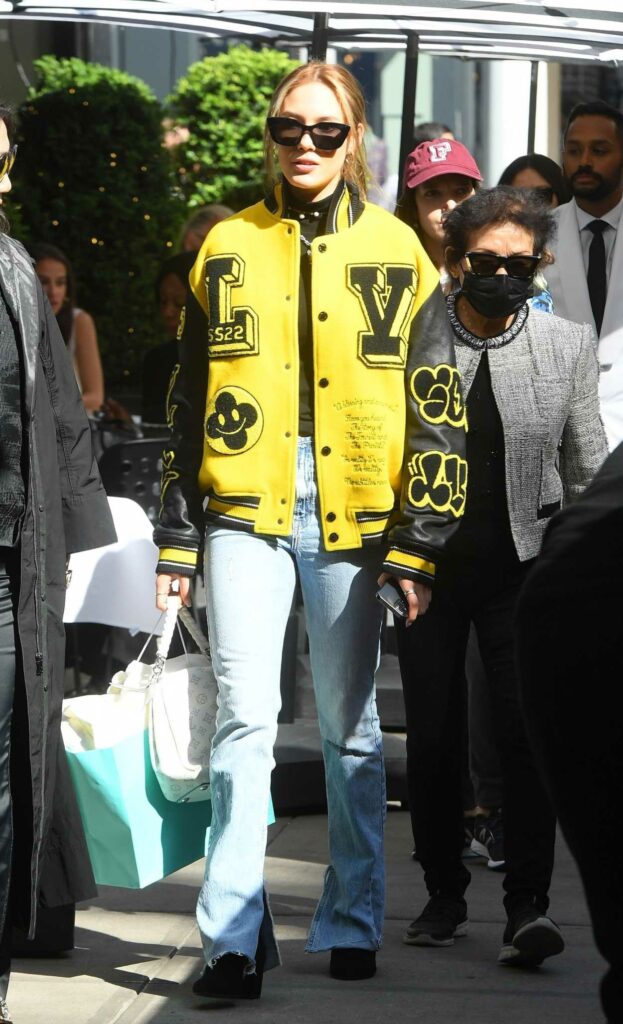 Eileen Gu in a Yellow Louis Vuitton Jacket