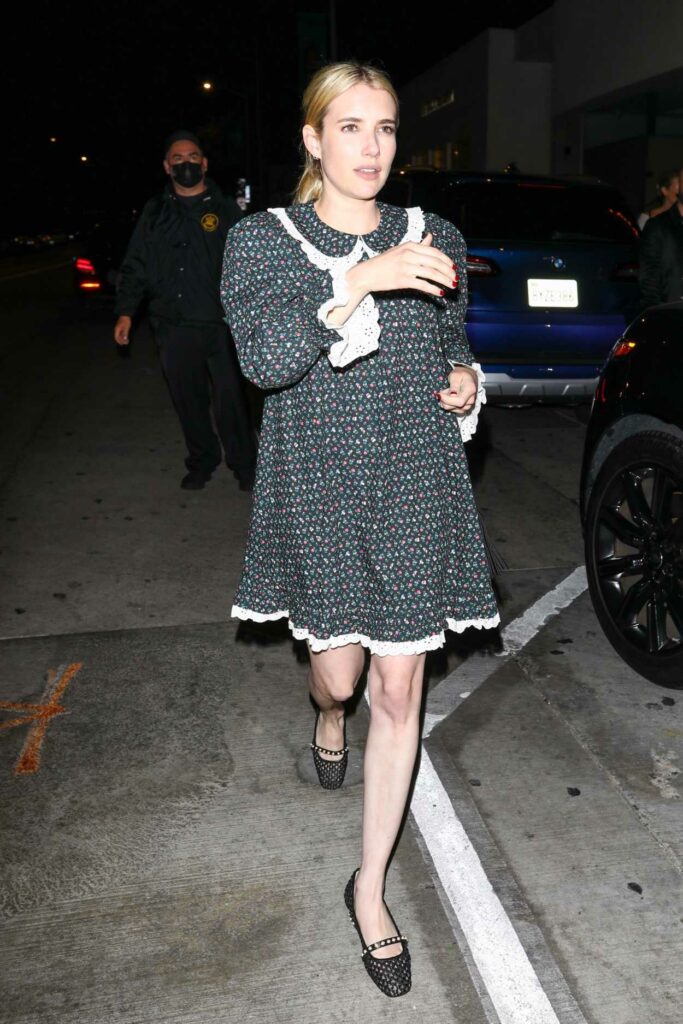 Emma Roberts in a Black Floral Dress