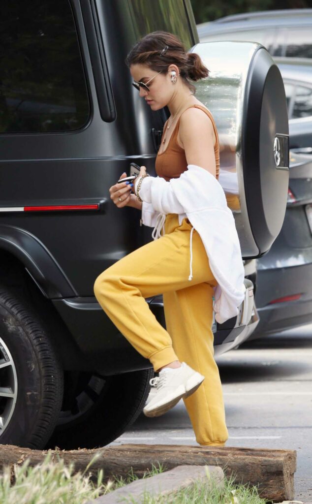 Lucy Hale in a Yellow Sweatpants
