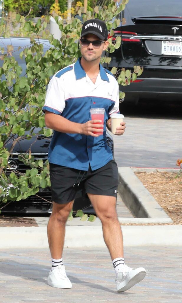 Taylor Lautner in a Black Cap