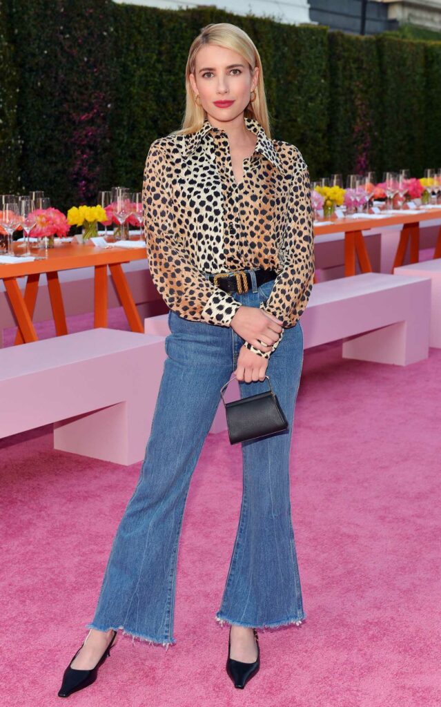 Emma Roberts in an Animal Print Blouse