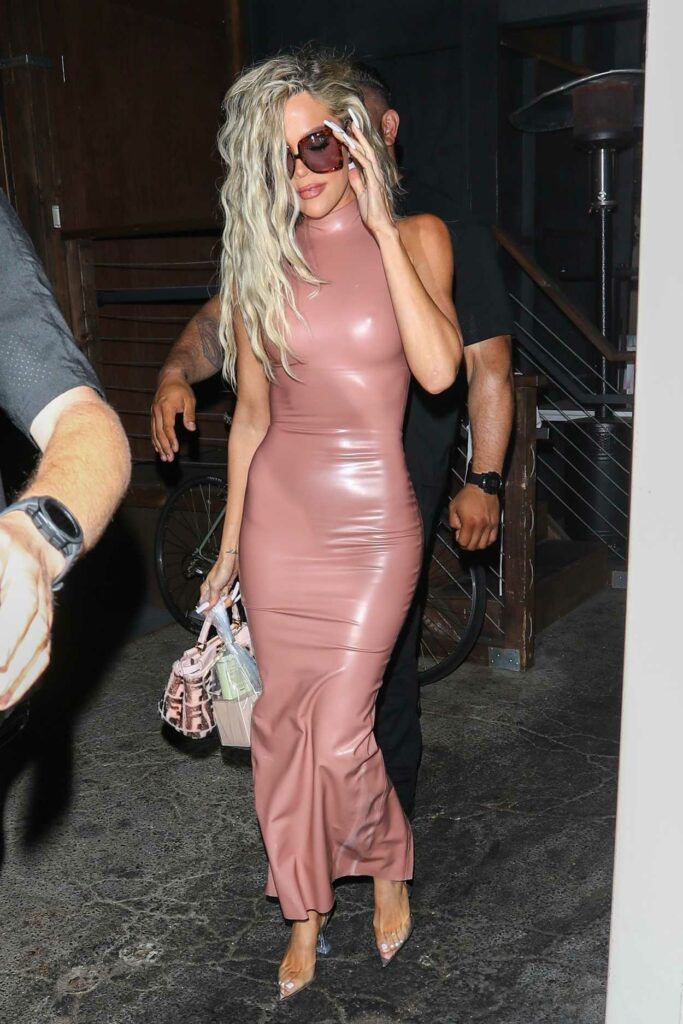 Khloe Kardashian in a Pink Leather Dress