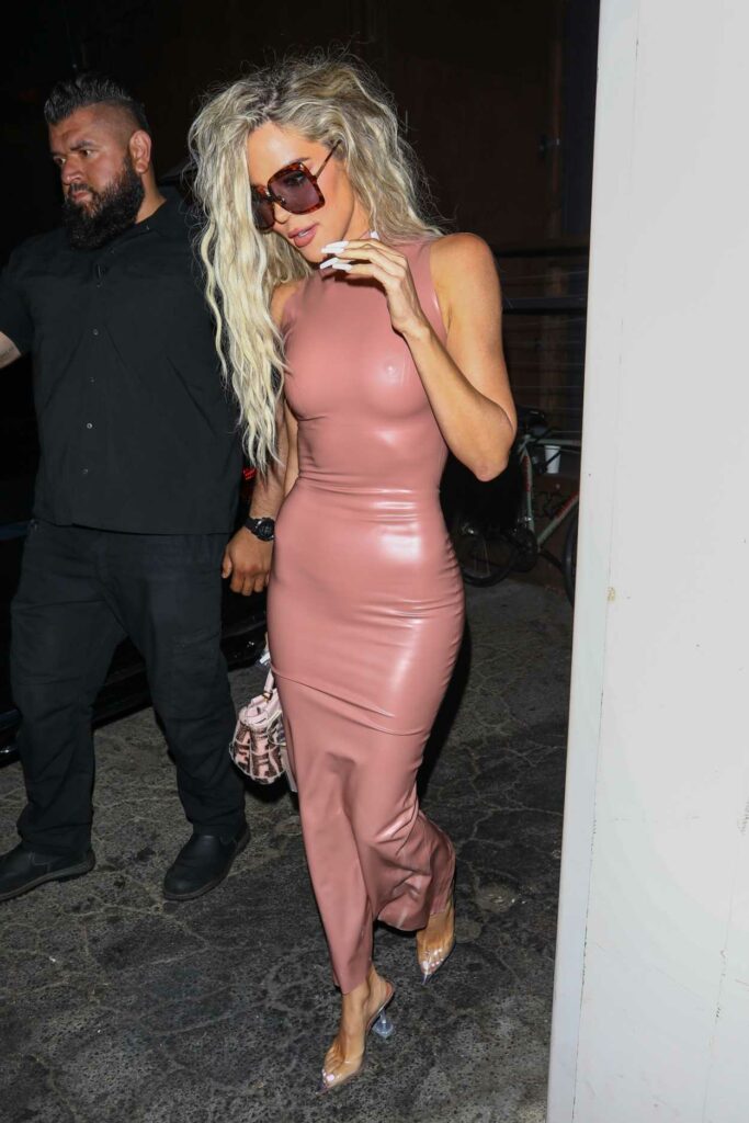 Khloe Kardashian in a Pink Leather Dress
