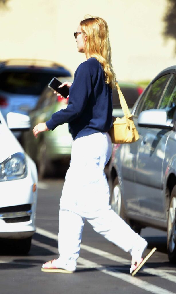 Lily-Rose Depp in a White Sweatpants