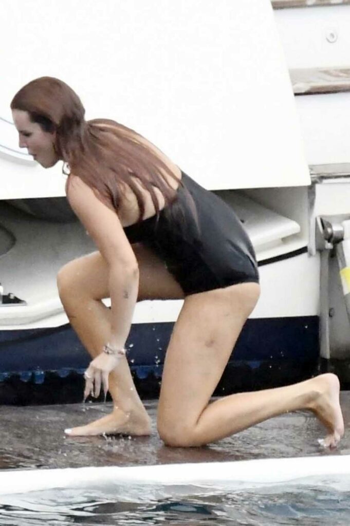 Bella Thorne in a Black Swimsuit