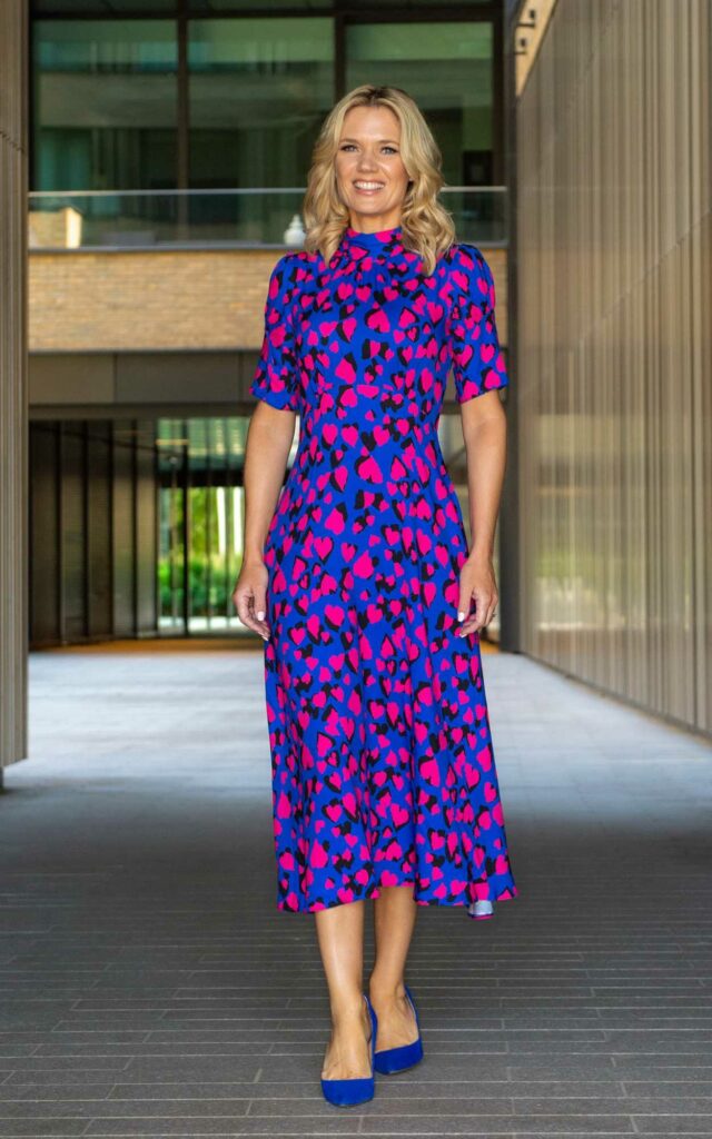 Charlotte Hawkins in a Blue Patterned Dress