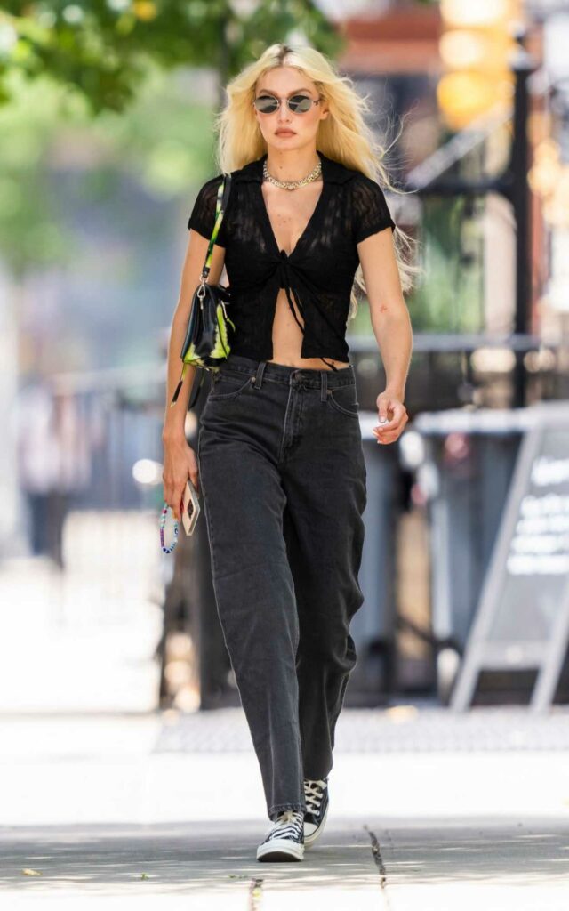 Gigi Hadid in a Black Midriff-Baring Blouse