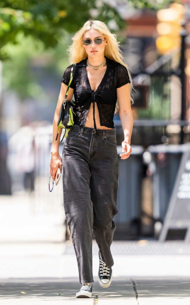 Gigi Hadid in a Black Midriff-Baring Blouse
