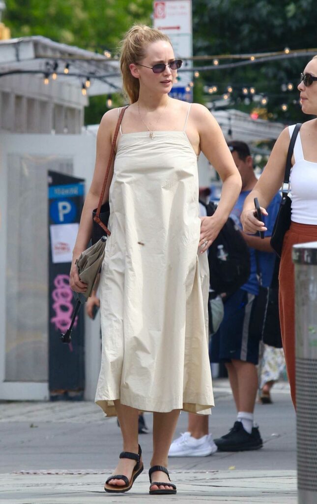 Jennifer Lawrence in a Beige Summer Dress