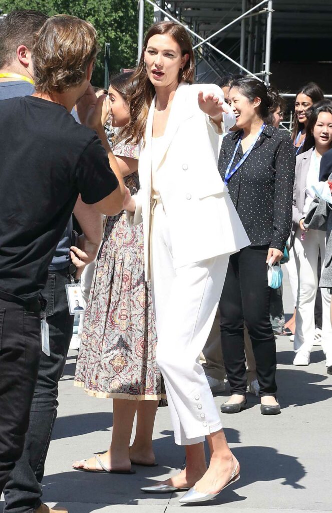 Karlie Kloss in a White Pantsuit
