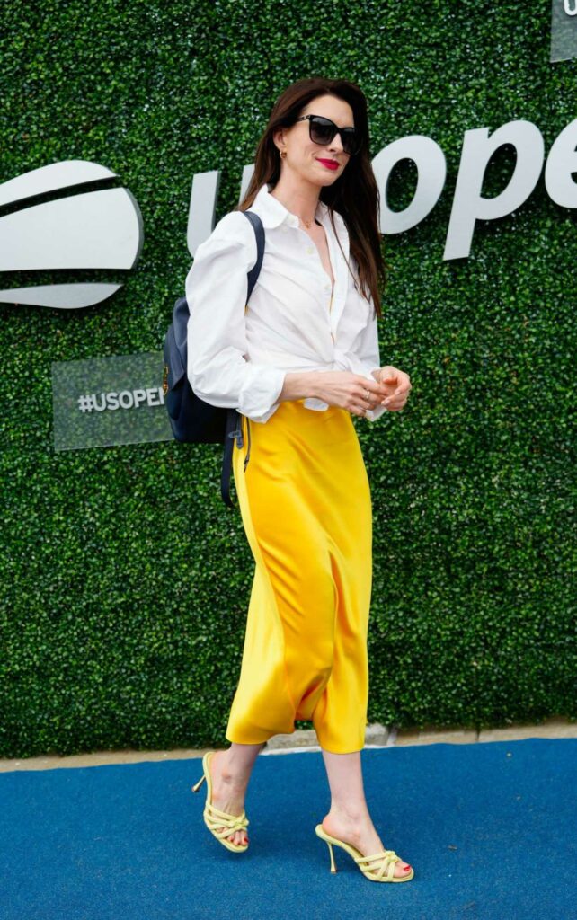 Anne Hathaway in a Yellow Skirt
