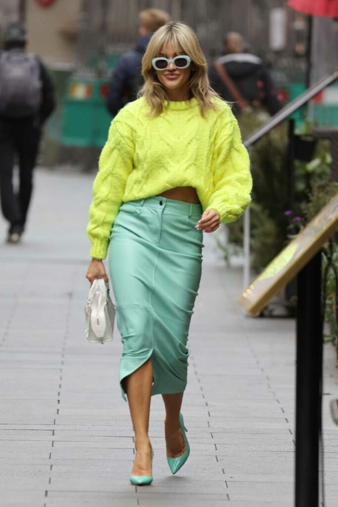 Ashley Roberts in a Yellow Sweater