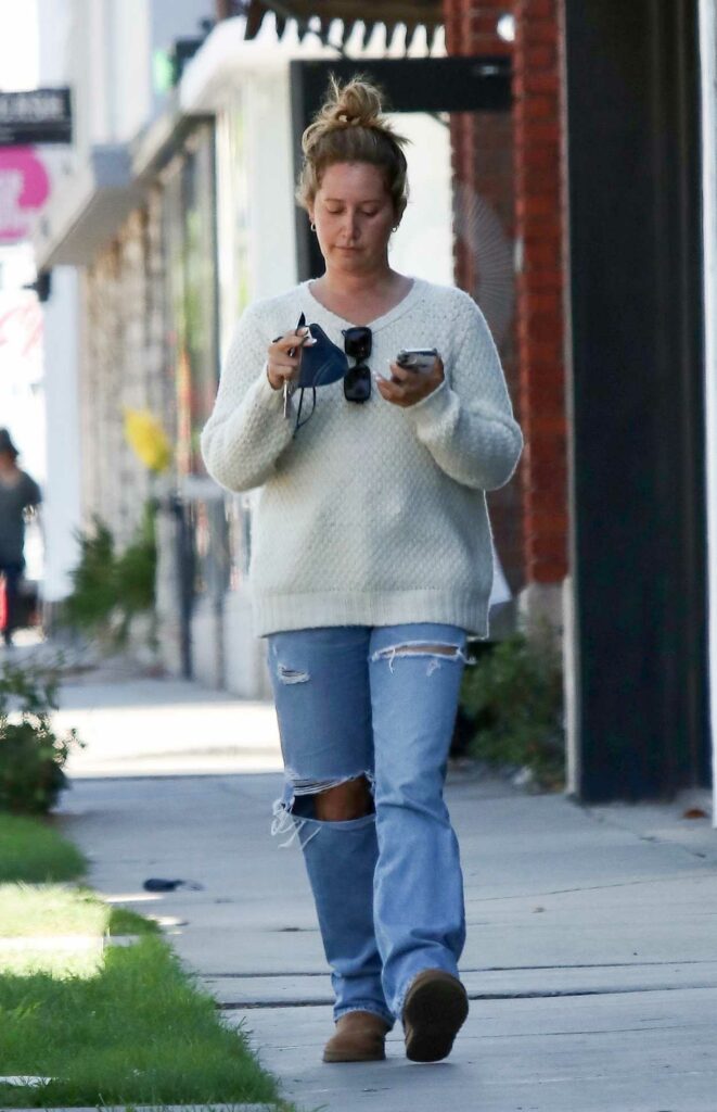 Ashley Tisdale in a Blue Ripped Jeans