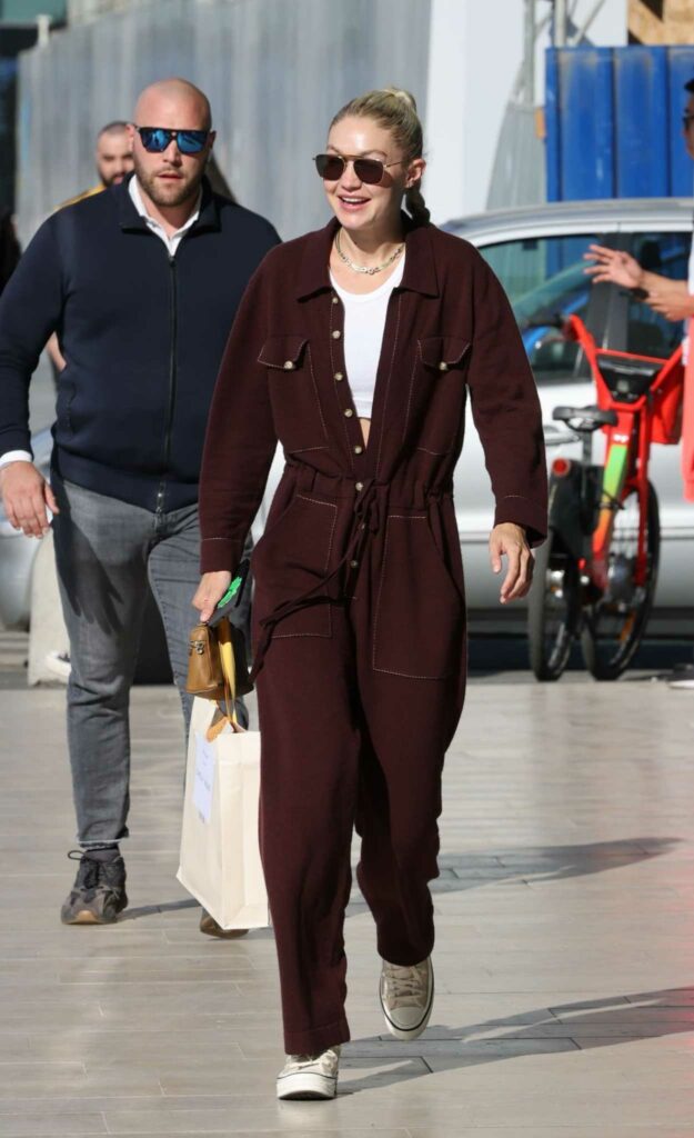 Gigi Hadid in a Burgundy Jumpsuit