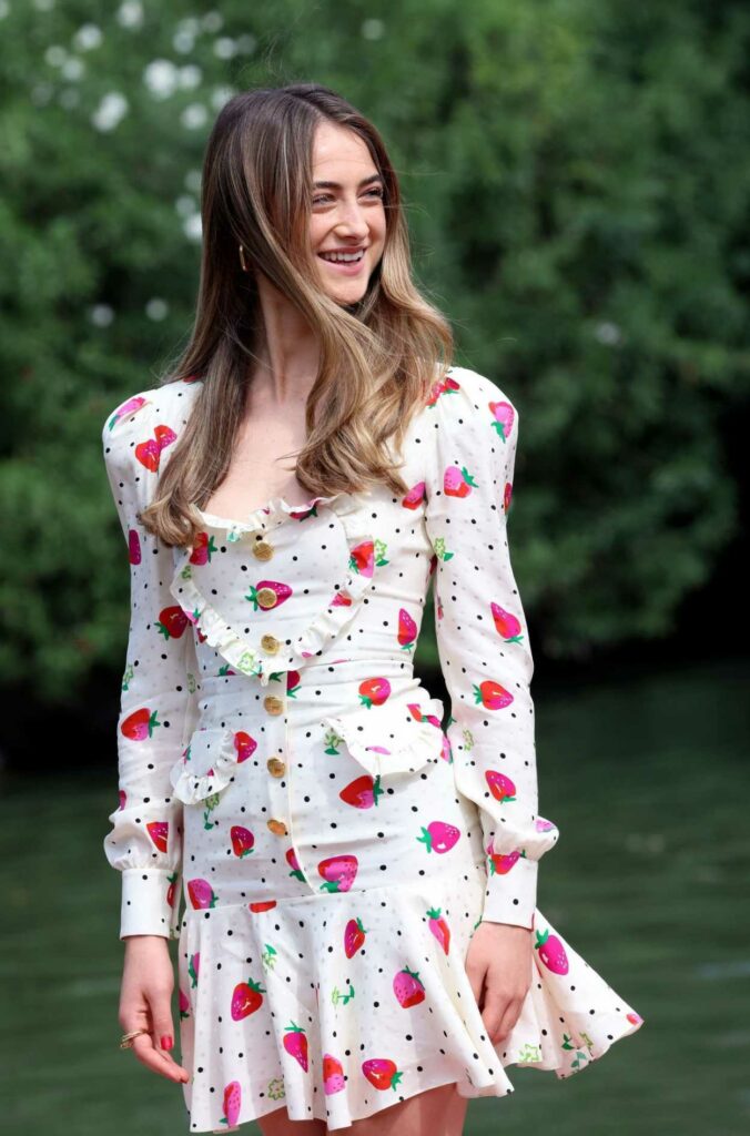 Raffey Cassidy in a White Strawberry Print Dress