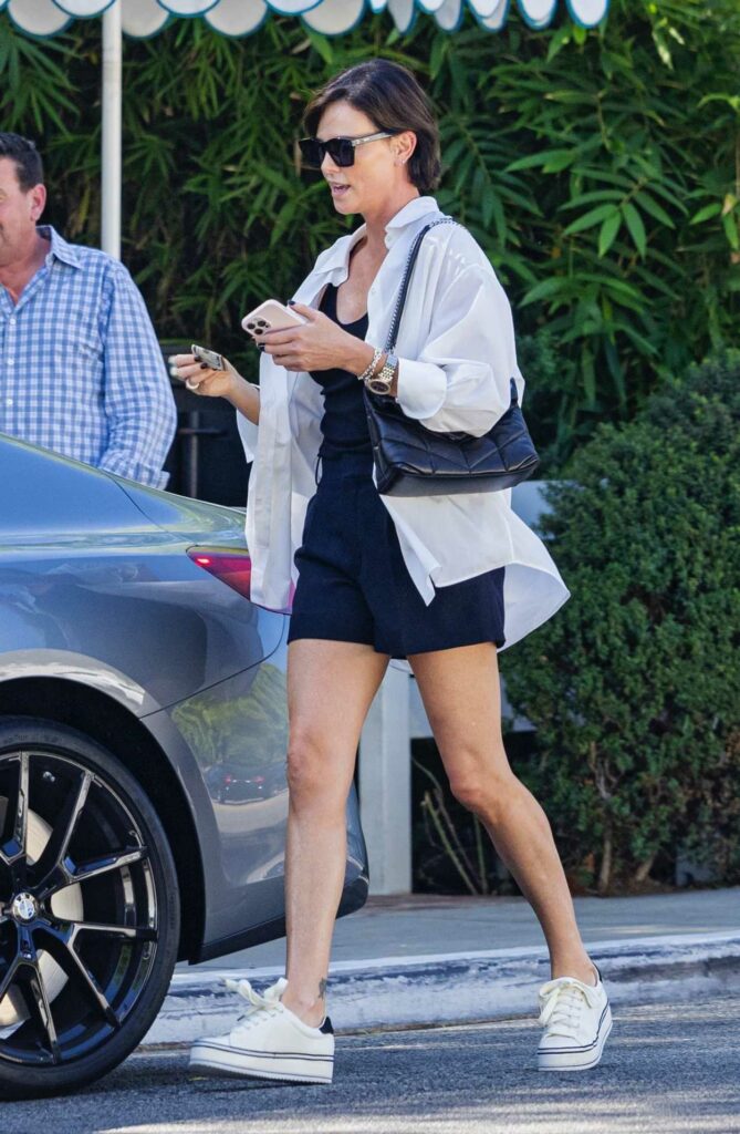 Charlize Theron in a White Sneakers