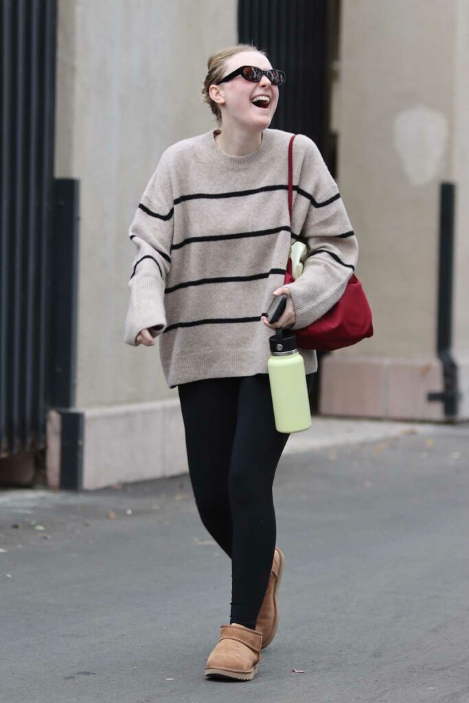Dakota Fanning in a Beige Sweater