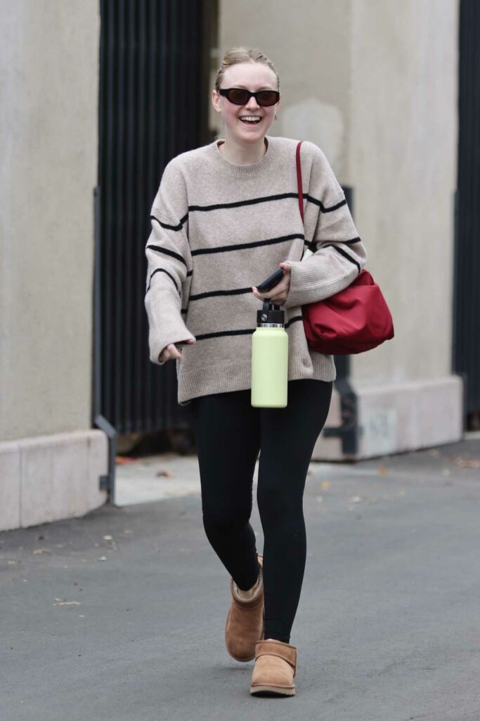Dakota Fanning in a Beige Sweater
