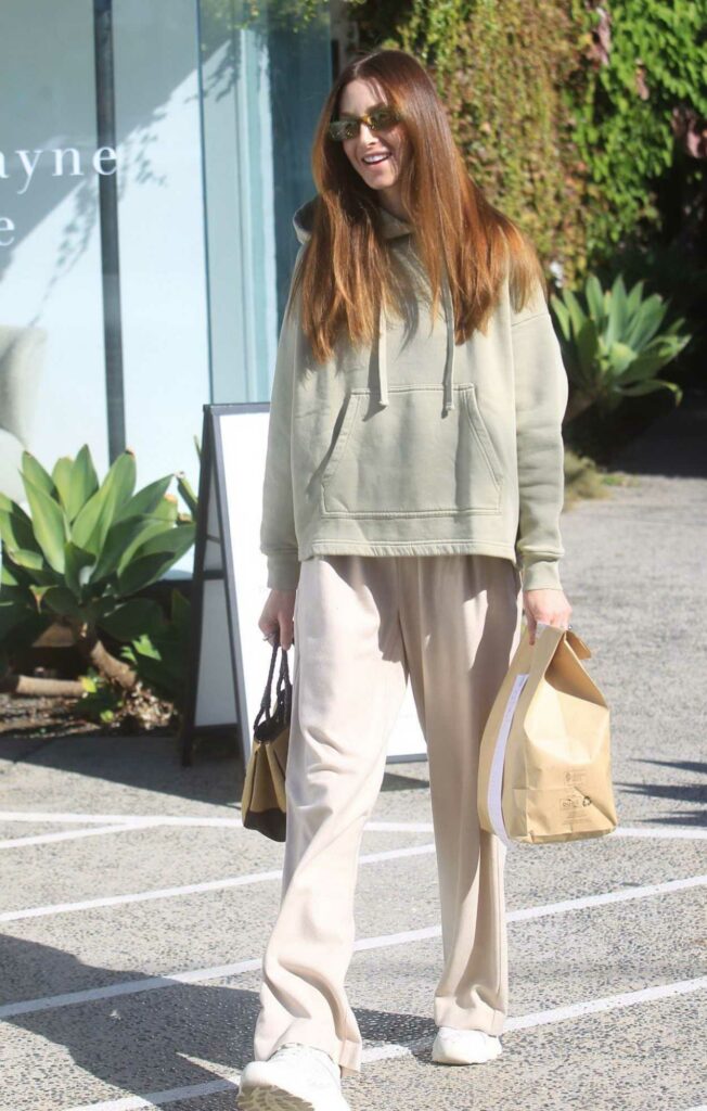 Whitney Port in an Olive Hoodie