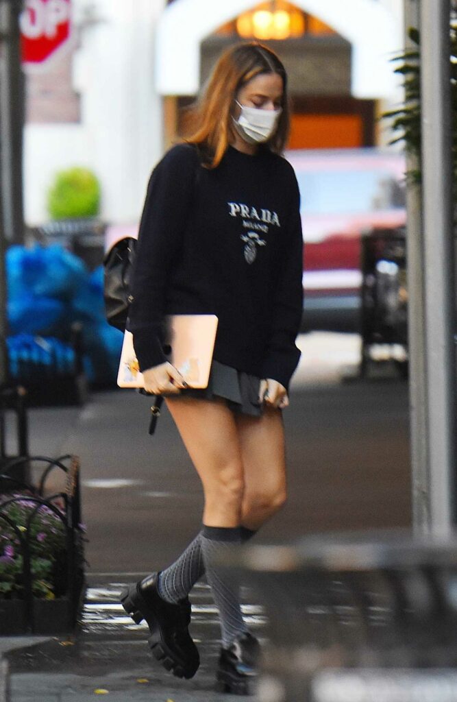 Margot Robbie in a Black Sweatshirt