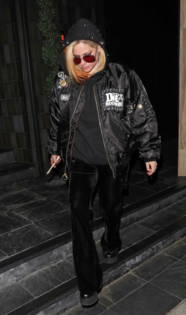 Avril Lavigne in a Black Bomber Jacket