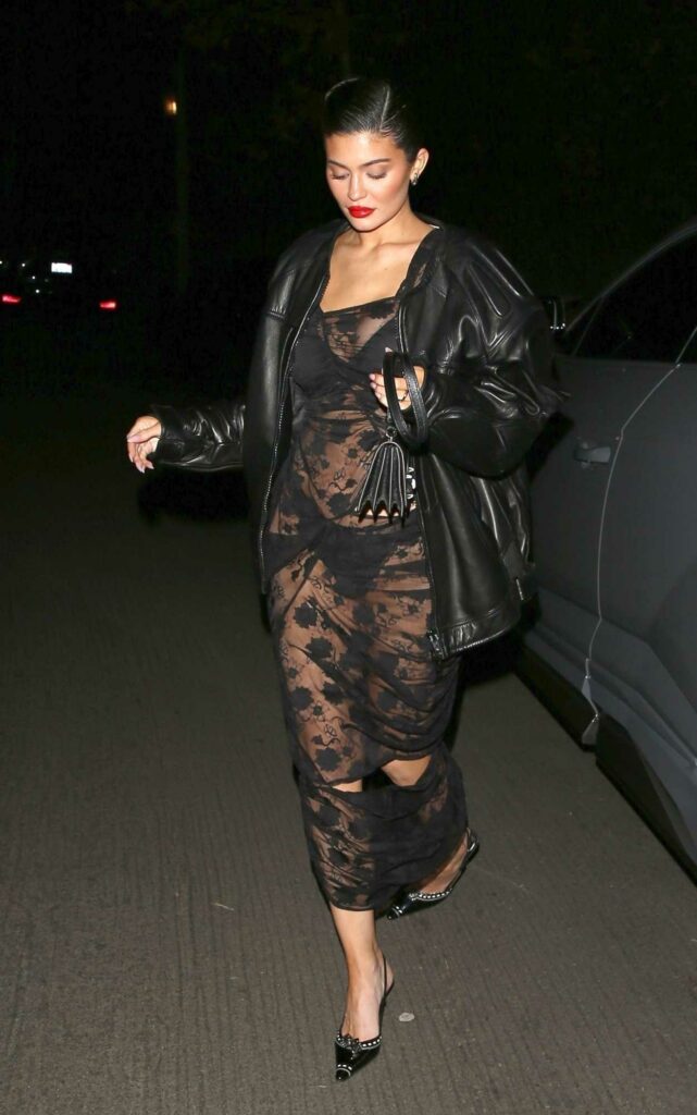 Kylie Jenner in a Black See-Through Lace Dress