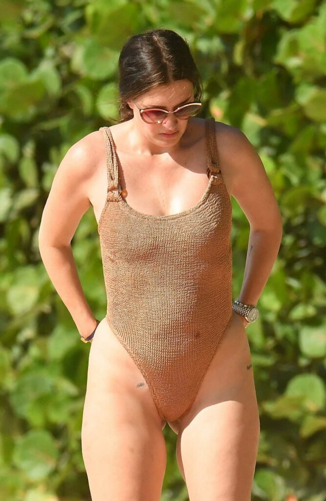 Rhea Durham in a Beige Swimsuit